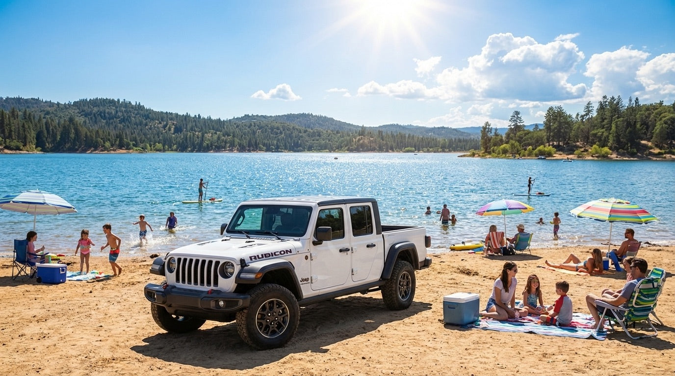 White Jeep Gladiator Rubicon parked at a lakeside beach