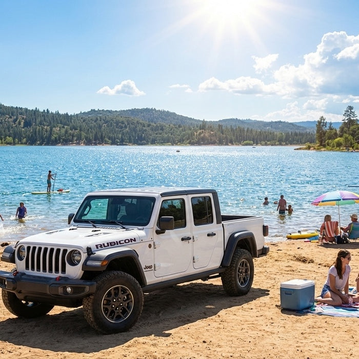 White Jeep Gladiator Rubicon parked at a lakeside beach