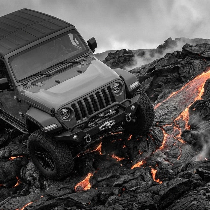 Jeep Wrangler JL on volcanic lava rocks - Must Have Jeep JL Accessories for 2026