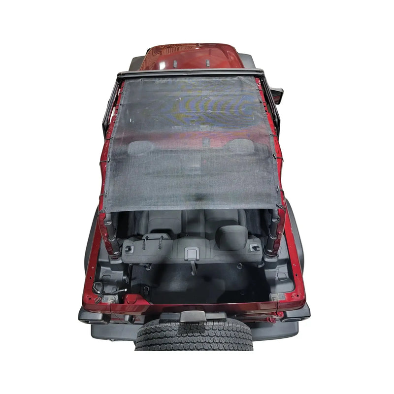Red 2-door Jeep Wrangler JL with a black mesh Hothead Sunshade installed, viewed from above.