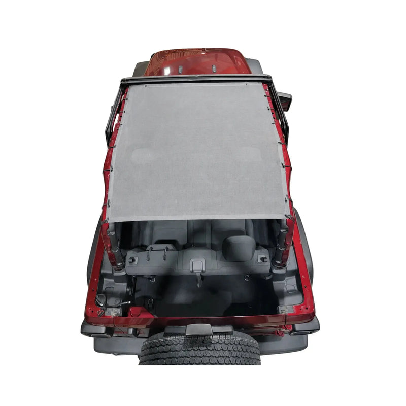 Gray mesh Hothead Sunshade installed on a red 2-door Jeep Wrangler JL.