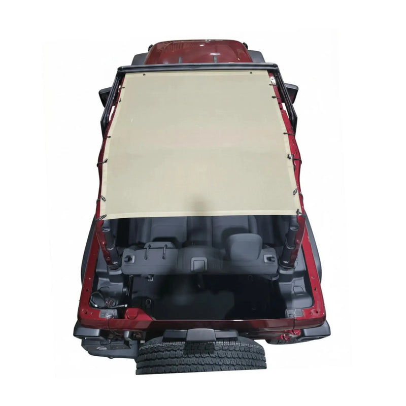 Tan mesh Hothead Sunshade installed on a red 2-door Jeep Wrangler JL.